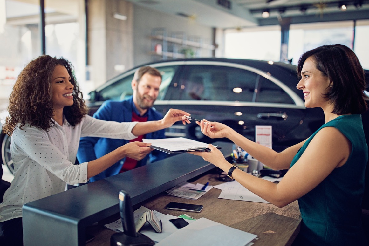 Couple is Buying New Car and Signing the Contract | X Chauffeurs | X Chauffeurs Luxury-chauffeur-london
