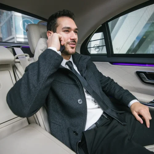 Businessman enjoying comfortable ride in Executive-Car-Hire-London